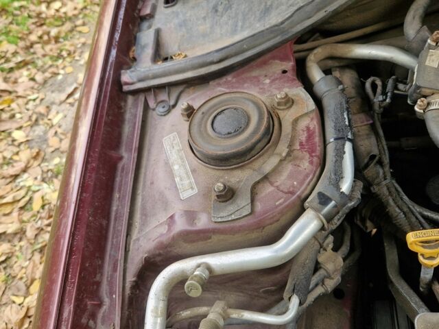 Червоний Тойота Carina E, об'ємом двигуна 1.6 л та пробігом 220 тис. км за 1500 $, фото 11 на Automoto.ua