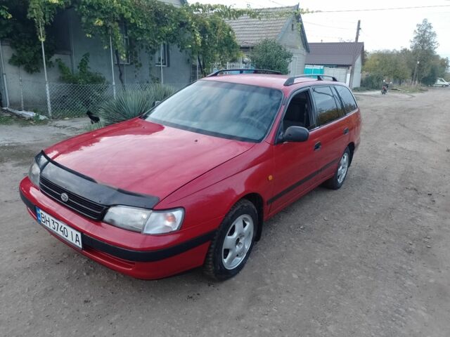 Червоний Тойота Carina E, об'ємом двигуна 1.6 л та пробігом 111 тис. км за 2000 $, фото 1 на Automoto.ua