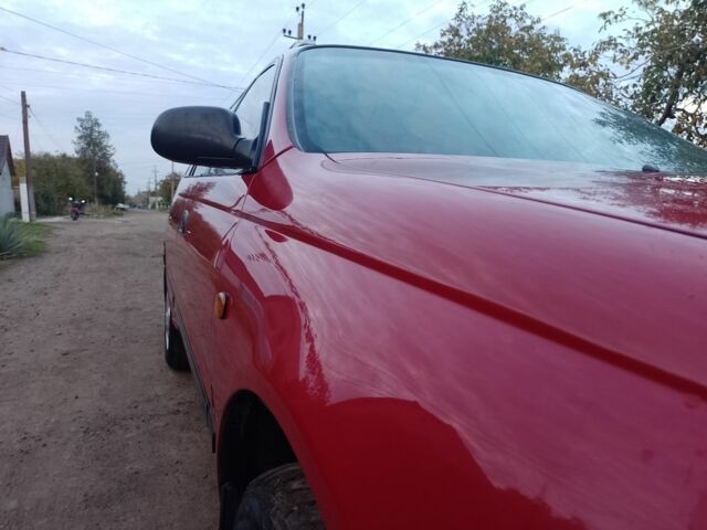 Червоний Тойота Carina E, об'ємом двигуна 1.6 л та пробігом 111 тис. км за 2000 $, фото 7 на Automoto.ua