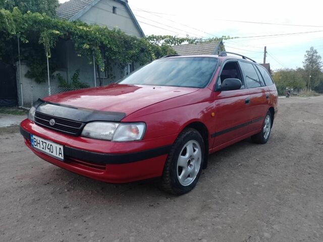 Червоний Тойота Carina E, об'ємом двигуна 1.6 л та пробігом 111 тис. км за 2000 $, фото 2 на Automoto.ua