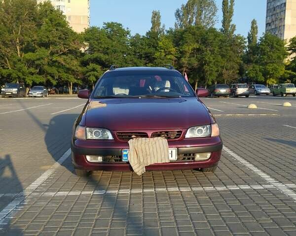 Красный Тойота Carina E, объемом двигателя 2 л и пробегом 450 тыс. км за 3700 $, фото 6 на Automoto.ua