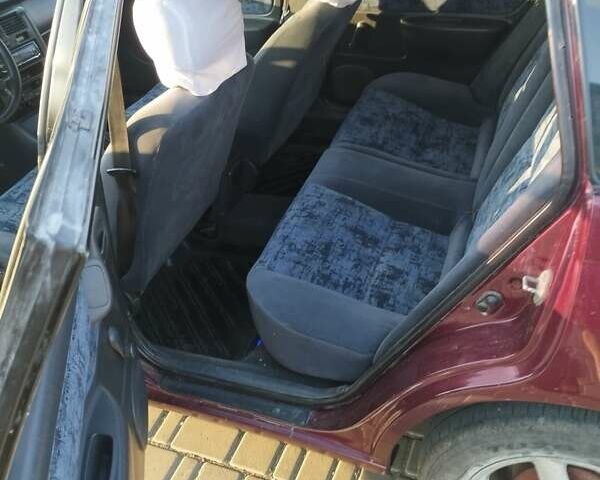 Красный Тойота Carina E, объемом двигателя 2 л и пробегом 450 тыс. км за 3700 $, фото 13 на Automoto.ua