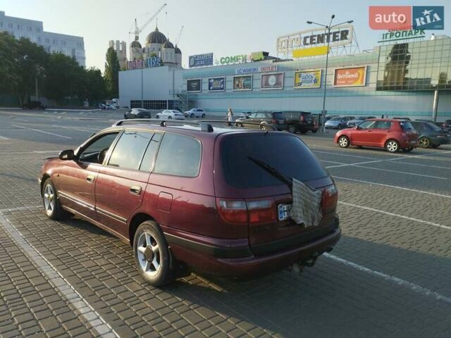 Красный Тойота Carina E, объемом двигателя 2 л и пробегом 450 тыс. км за 3700 $, фото 18 на Automoto.ua