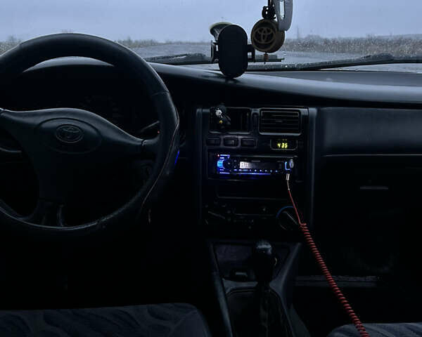 Сірий Тойота Carina E, об'ємом двигуна 2 л та пробігом 450 тис. км за 3000 $, фото 12 на Automoto.ua