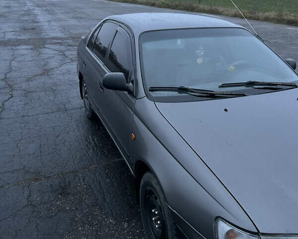 Сірий Тойота Carina E, об'ємом двигуна 2 л та пробігом 450 тис. км за 3000 $, фото 8 на Automoto.ua