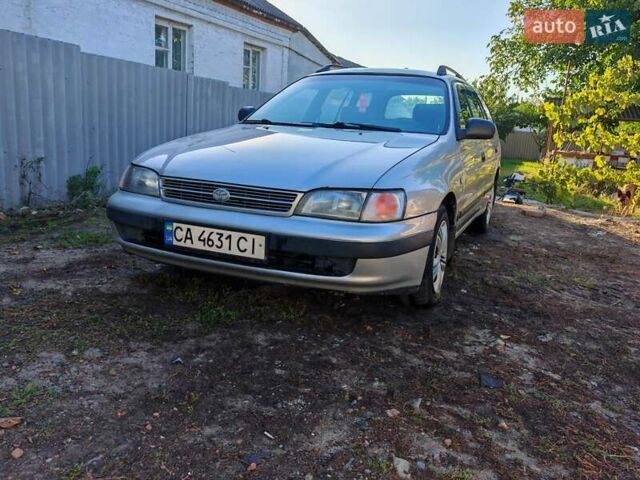 Сірий Тойота Carina E, об'ємом двигуна 1.8 л та пробігом 256 тис. км за 2850 $, фото 7 на Automoto.ua