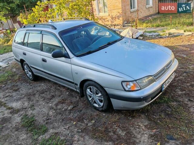 Сірий Тойота Carina E, об'ємом двигуна 1.8 л та пробігом 256 тис. км за 2850 $, фото 9 на Automoto.ua