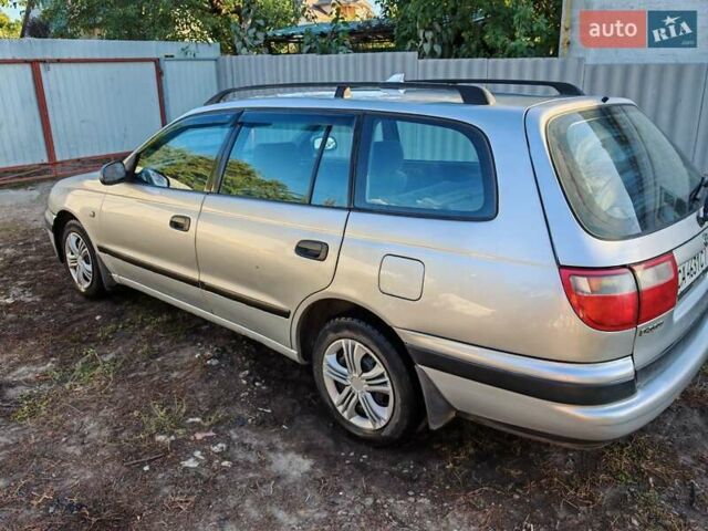 Сірий Тойота Carina E, об'ємом двигуна 1.8 л та пробігом 256 тис. км за 2850 $, фото 3 на Automoto.ua