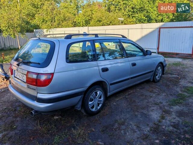 Сірий Тойота Carina E, об'ємом двигуна 1.8 л та пробігом 256 тис. км за 2850 $, фото 6 на Automoto.ua