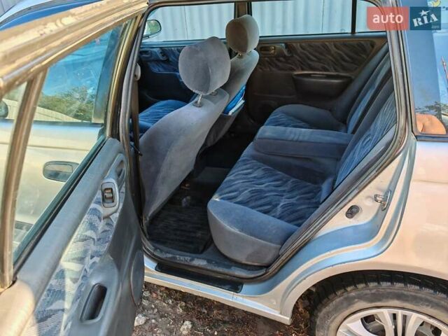 Сірий Тойота Carina E, об'ємом двигуна 1.8 л та пробігом 256 тис. км за 2850 $, фото 13 на Automoto.ua