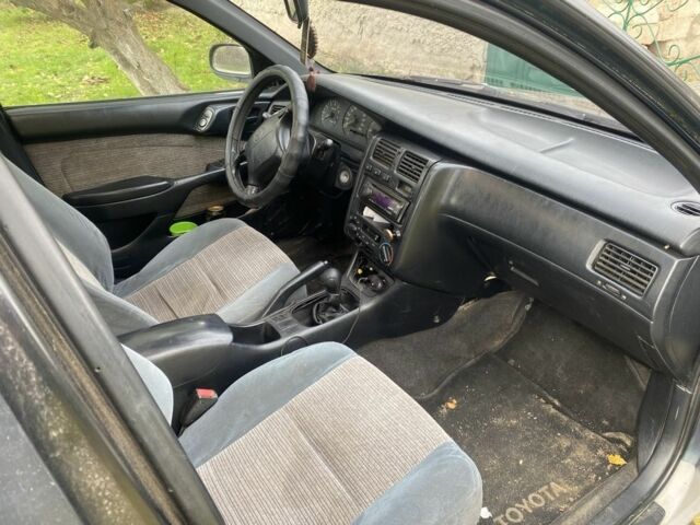 Синий Тойота Carina E, объемом двигателя 1.8 л и пробегом 624 тыс. км за 1750 $, фото 2 на Automoto.ua