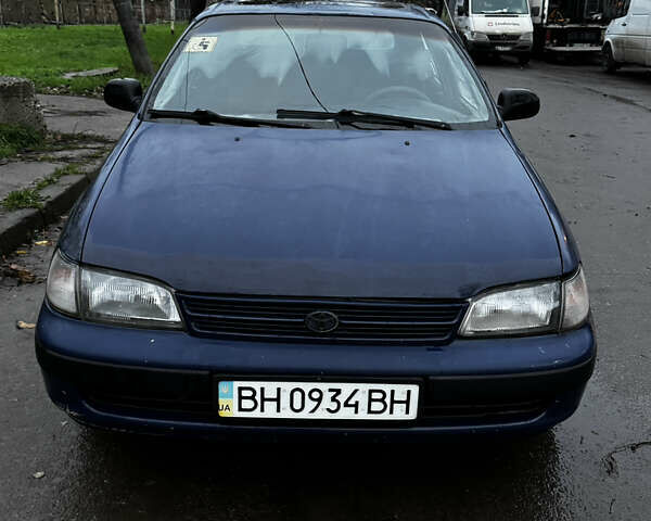 Синій Тойота Carina E, об'ємом двигуна 2 л та пробігом 188 тис. км за 1750 $, фото 2 на Automoto.ua