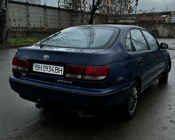 Синій Тойота Carina E, об'ємом двигуна 2 л та пробігом 188 тис. км за 1750 $, фото 4 на Automoto.ua