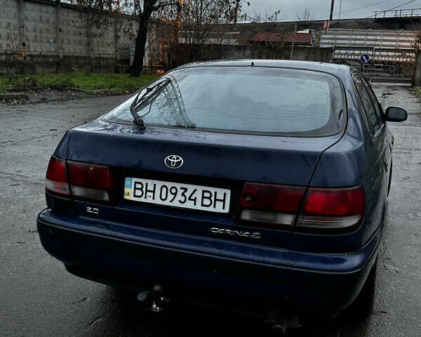 Синій Тойота Carina E, об'ємом двигуна 2 л та пробігом 188 тис. км за 1750 $, фото 5 на Automoto.ua