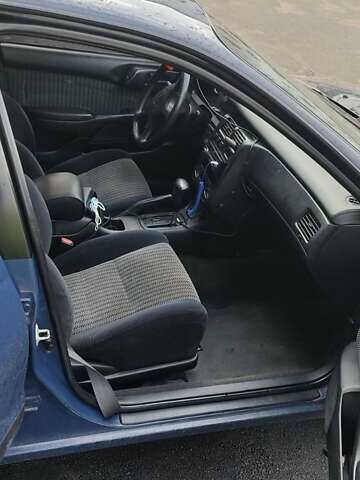 Синій Тойота Carina E, об'ємом двигуна 2 л та пробігом 397 тис. км за 4750 $, фото 8 на Automoto.ua