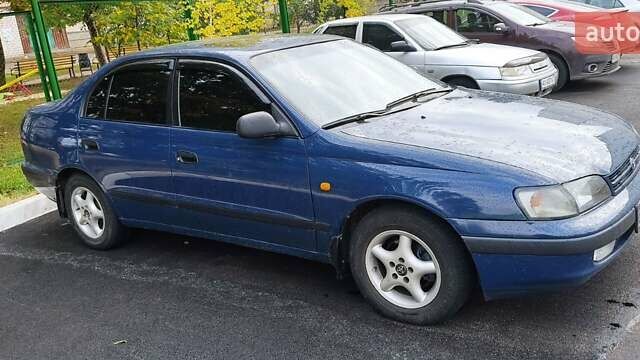 Синій Тойота Carina E, об'ємом двигуна 2 л та пробігом 397 тис. км за 4750 $, фото 4 на Automoto.ua