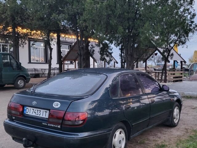 Синій Тойота Carina E, об'ємом двигуна 1.8 л та пробігом 290 тис. км за 1650 $, фото 6 на Automoto.ua