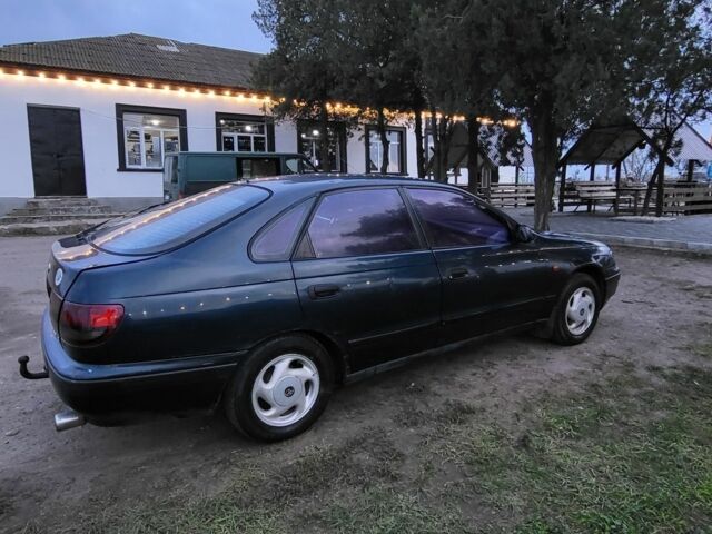 Синій Тойота Carina E, об'ємом двигуна 1.8 л та пробігом 290 тис. км за 1650 $, фото 4 на Automoto.ua
