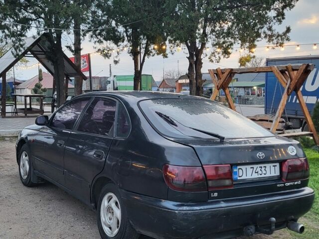 Синій Тойота Carina E, об'ємом двигуна 1.8 л та пробігом 290 тис. км за 1650 $, фото 5 на Automoto.ua