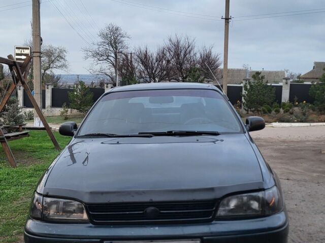 Синій Тойота Carina E, об'ємом двигуна 1.8 л та пробігом 290 тис. км за 1650 $, фото 1 на Automoto.ua