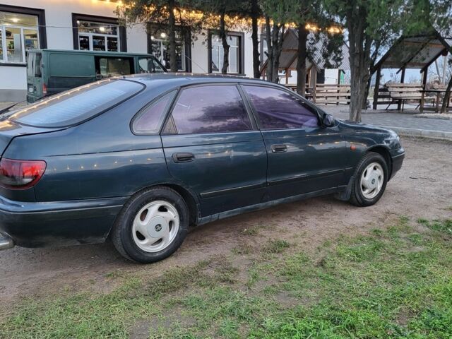 Синій Тойота Carina E, об'ємом двигуна 1.8 л та пробігом 290 тис. км за 1650 $, фото 8 на Automoto.ua