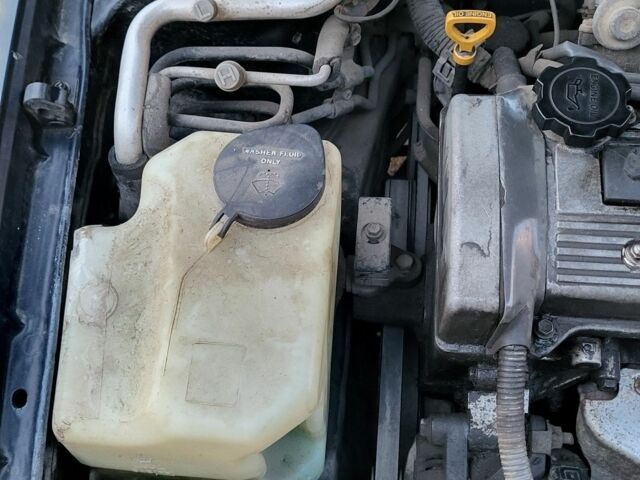 Синій Тойота Carina E, об'ємом двигуна 1.8 л та пробігом 290 тис. км за 1650 $, фото 11 на Automoto.ua