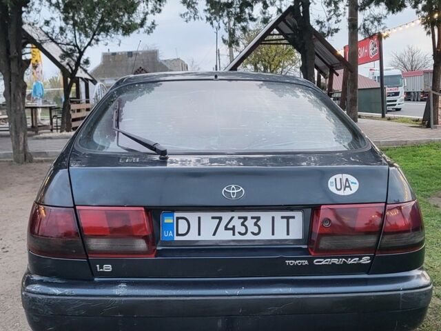 Синій Тойота Carina E, об'ємом двигуна 1.8 л та пробігом 290 тис. км за 1650 $, фото 7 на Automoto.ua