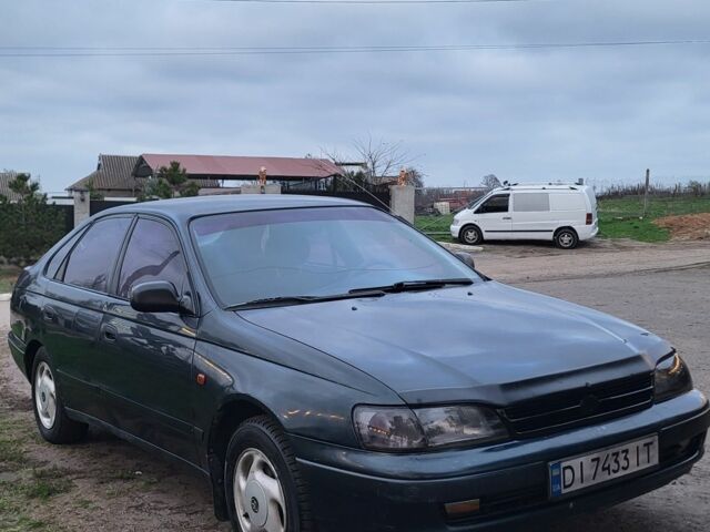 Синій Тойота Carina E, об'ємом двигуна 1.8 л та пробігом 290 тис. км за 1650 $, фото 2 на Automoto.ua