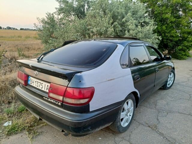 Зеленый Тойота Carina E, объемом двигателя 2 л и пробегом 300 тыс. км за 2699 $, фото 3 на Automoto.ua