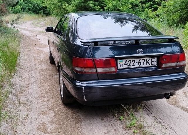 Тойота Carina E 1993 у Чернівцях на Automoto.ua Зелений Тойота Carina E, об'ємом двигуна 2 л та пробігом 290 тис. км за 2400 $, фото 4 на Automoto.ua
