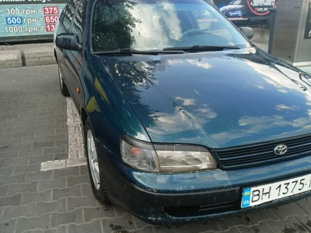 Зеленый Тойота Carina E, объемом двигателя 2 л и пробегом 300 тыс. км за 2699 $, фото 1 на Automoto.ua