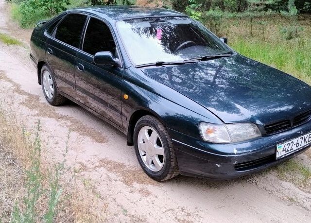 Тойота Carina E 1993 у Чернівцях на Automoto.ua Зелений Тойота Carina E, об'ємом двигуна 2 л та пробігом 290 тис. км за 2400 $, фото 2 на Automoto.ua