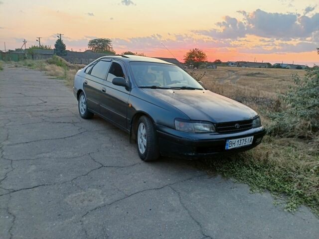 Зеленый Тойота Carina E, объемом двигателя 2 л и пробегом 300 тыс. км за 2699 $, фото 2 на Automoto.ua