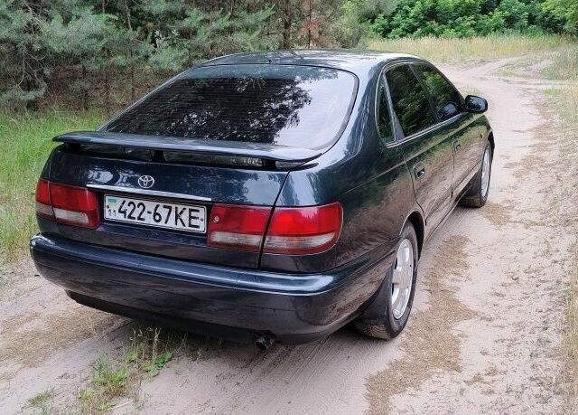 Тойота Carina E 1993 у Чернівцях на Automoto.ua Зелений Тойота Carina E, об'ємом двигуна 2 л та пробігом 290 тис. км за 2400 $, фото 3 на Automoto.ua