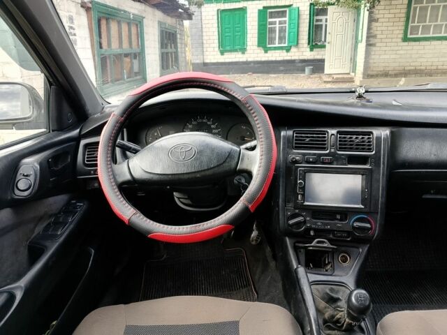 Зеленый Тойота Carina E, объемом двигателя 1.6 л и пробегом 200 тыс. км за 2100 $, фото 6 на Automoto.ua