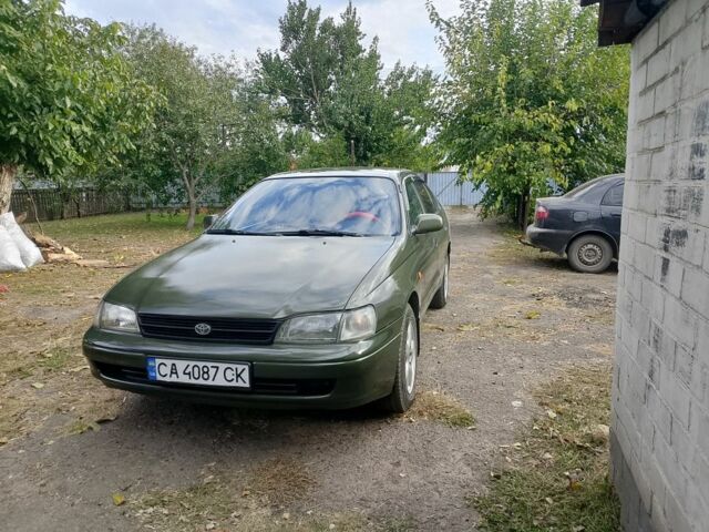 Зеленый Тойота Carina E, объемом двигателя 1.6 л и пробегом 200 тыс. км за 2100 $, фото 1 на Automoto.ua