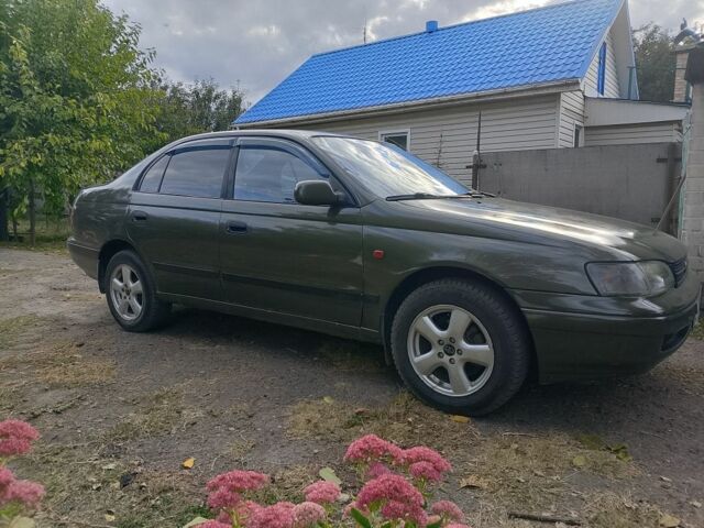 Зеленый Тойота Carina E, объемом двигателя 1.6 л и пробегом 200 тыс. км за 2100 $, фото 2 на Automoto.ua