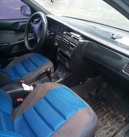 Зеленый Тойота Carina E, объемом двигателя 1.6 л и пробегом 180 тыс. км за 2099 $, фото 6 на Automoto.ua