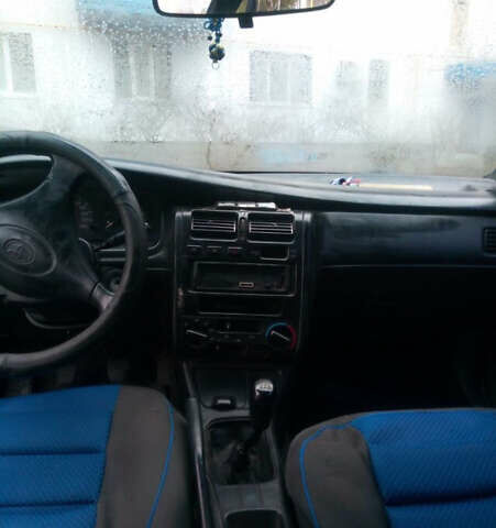 Зеленый Тойота Carina E, объемом двигателя 1.6 л и пробегом 180 тыс. км за 2099 $, фото 5 на Automoto.ua