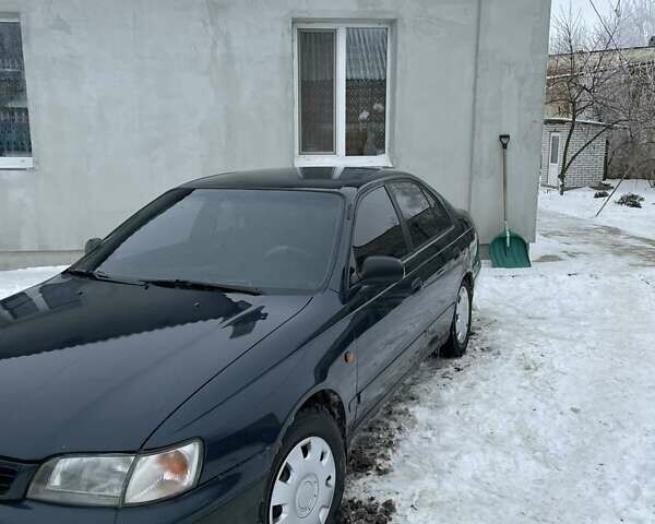 Зеленый Тойота Carina E, объемом двигателя 1.6 л и пробегом 444 тыс. км за 3600 $, фото 1 на Automoto.ua