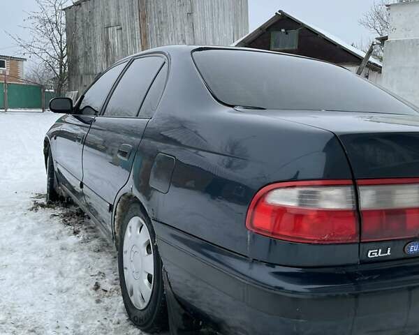 Зеленый Тойота Carina E, объемом двигателя 1.6 л и пробегом 444 тыс. км за 3600 $, фото 3 на Automoto.ua