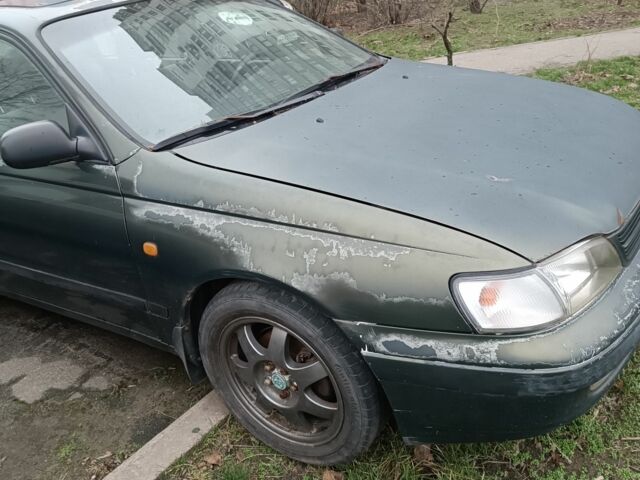 Зеленый Тойота Carina E, объемом двигателя 1.6 л и пробегом 360 тыс. км за 1400 $, фото 1 на Automoto.ua