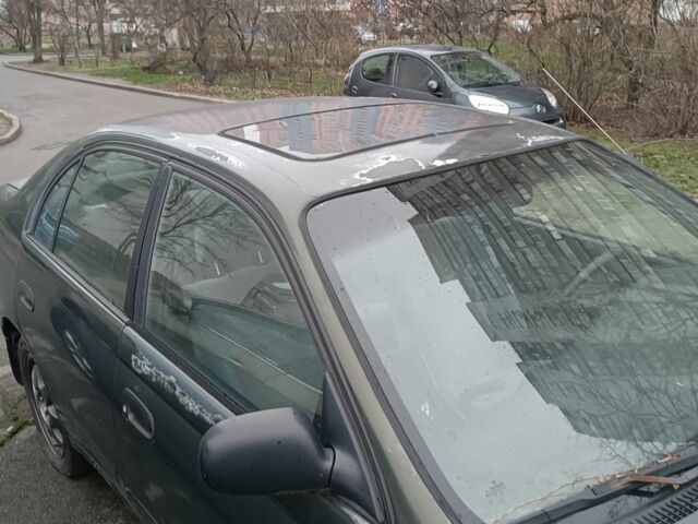 Зеленый Тойота Carina E, объемом двигателя 1.6 л и пробегом 360 тыс. км за 1400 $, фото 2 на Automoto.ua