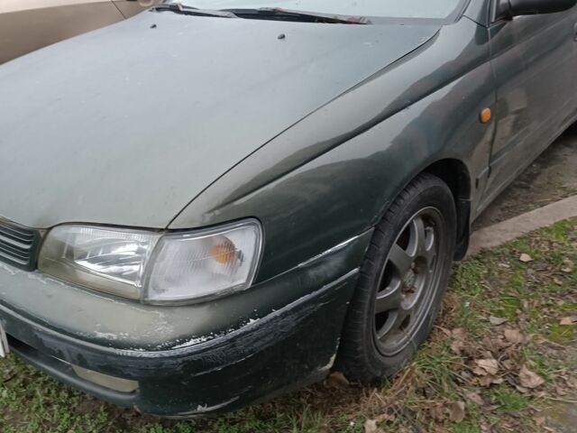 Зеленый Тойота Carina E, объемом двигателя 1.6 л и пробегом 360 тыс. км за 1400 $, фото 8 на Automoto.ua