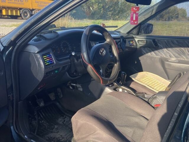 Зеленый Тойота Carina E, объемом двигателя 1.8 л и пробегом 372 тыс. км за 2150 $, фото 4 на Automoto.ua