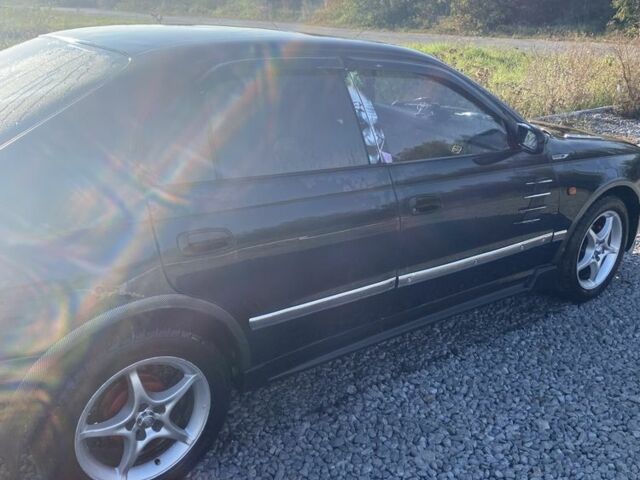 Зеленый Тойота Carina E, объемом двигателя 1.8 л и пробегом 372 тыс. км за 2150 $, фото 2 на Automoto.ua