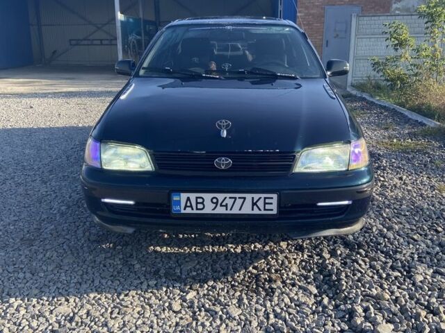 Зеленый Тойота Carina E, объемом двигателя 1.8 л и пробегом 372 тыс. км за 2150 $, фото 1 на Automoto.ua