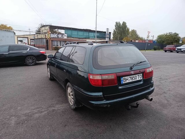 Зелений Тойота Carina E, об'ємом двигуна 1.6 л та пробігом 290 тис. км за 2300 $, фото 4 на Automoto.ua