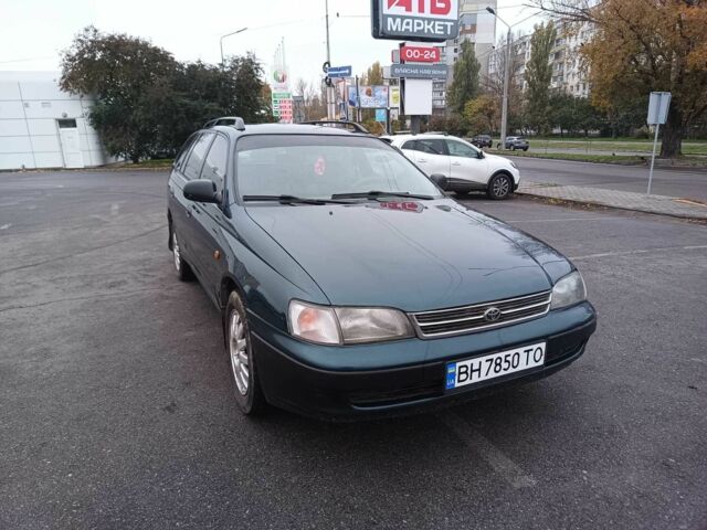 Зелений Тойота Carina E, об'ємом двигуна 1.6 л та пробігом 290 тис. км за 2300 $, фото 1 на Automoto.ua