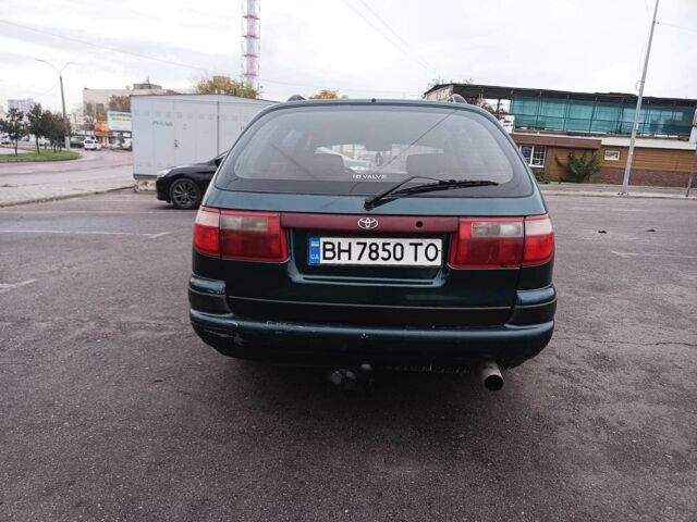 Зелений Тойота Carina E, об'ємом двигуна 1.6 л та пробігом 290 тис. км за 2300 $, фото 6 на Automoto.ua